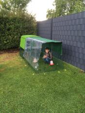 Omlet green Eglu Cube large chicken coop and run with child in run