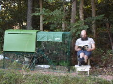 Son Curtis relaxing by the chickens.  I call him 